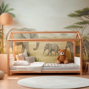 Elephant and zebra wallpaper transforming kids playroom into safari adventure space