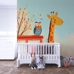 Animal-themed mural wallpaper featuring safari giraffe and owl in kids playroom by Kids-Mundo
