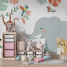 Elephant and tropical birds mural wallpaper in cozy toddler room setting