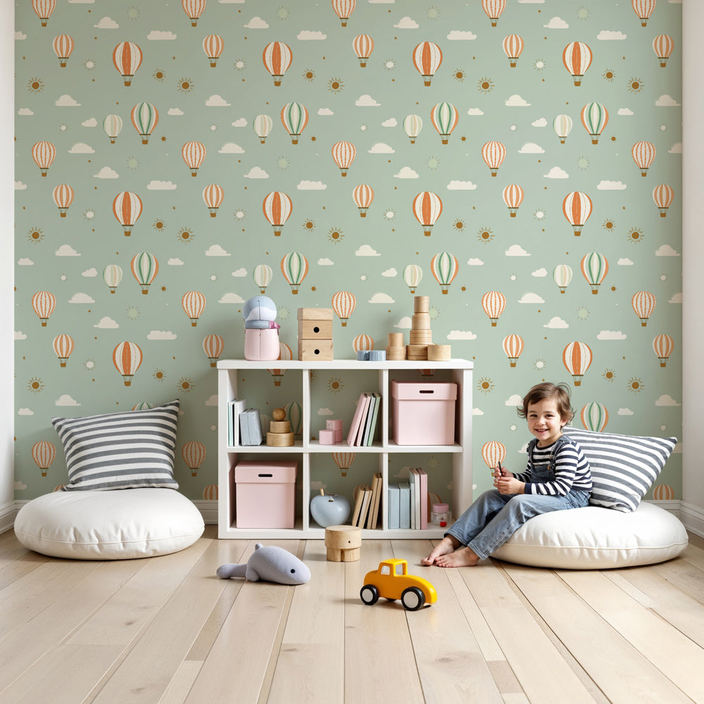 Kids-Mundo sage green hot air balloon pattern wall mural in a nursery setting