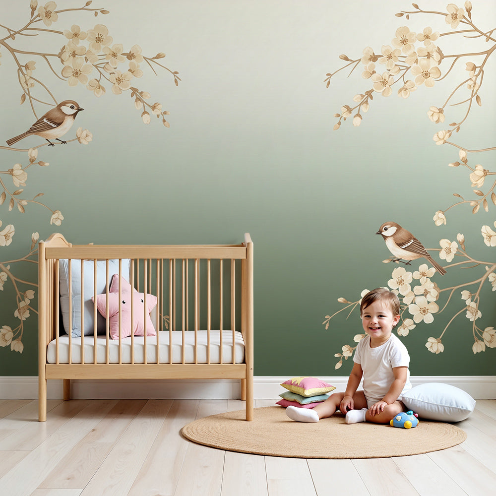 Kids-Mundo sage green blossom tree branch wall mural in a calm, softly lit nursery.