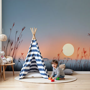 Savanna sunset mural wallpaper creating warm African landscape atmosphere in modern nursery by Kids-Mundo
