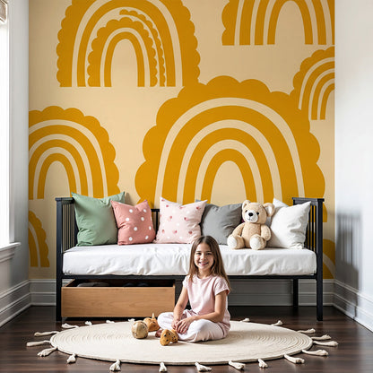 Nursery wall showing the Kids-Mundo scalloped cloud-edge rainbow wall mural in mustard tones