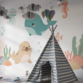 Underwater ocean mural wallpaper creating marine themed kids bedroom with coral reef design