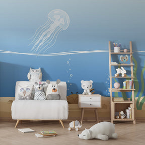 Sea life mural wallpaper with marine creatures decorating bright kids playroom space