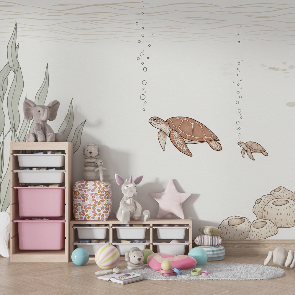 Marine themed baby bedroom with sea turtle mural wallpaper and coastal decor elements