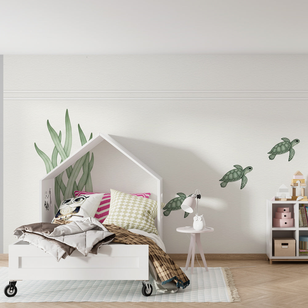 Gentle sea turtle mural wallpaper creating calming underwater atmosphere in kids room