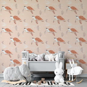 Ocean themed children's bedroom featuring sea turtle wallpaper with soft pastel colors