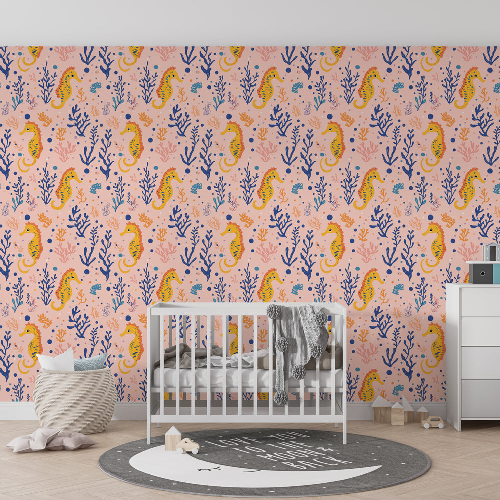 Pink coral reef wallpaper with seahorses decorating modern children's nursery room