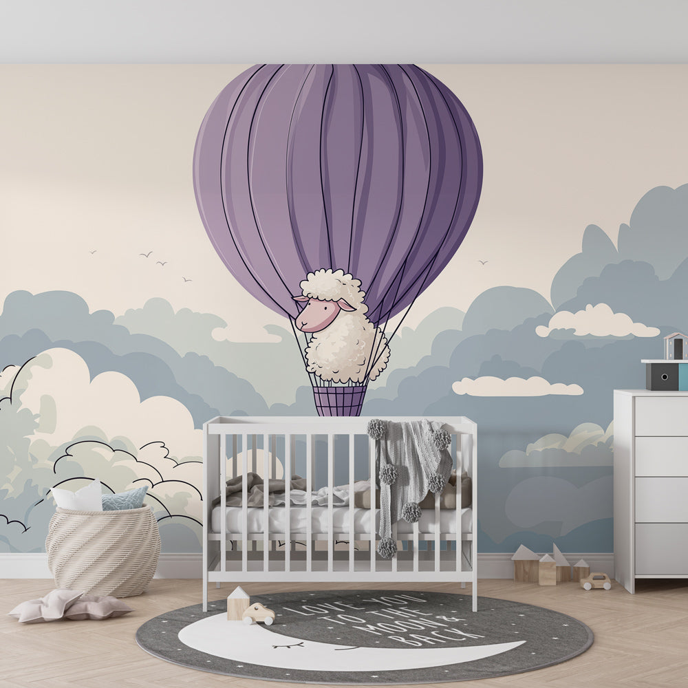 Whimsical sheep balloon mural wallpaper with soft blue clouds for baby room decor by Kids-Mundo