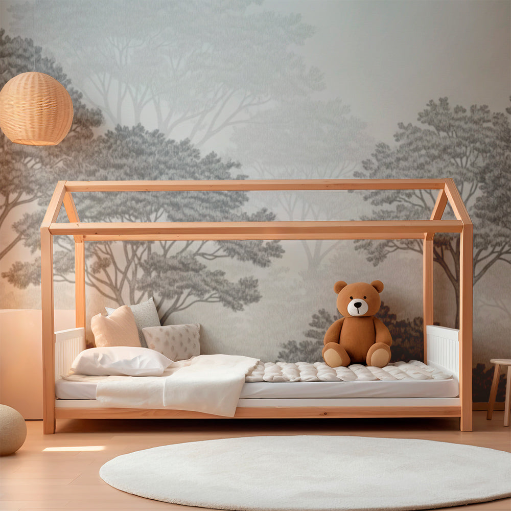 Kids-Mundo hand-sketched forest wall mural creating a calm reading corner in a children's playroom