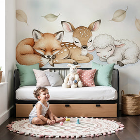 Sleeping animals mural wallpaper in modern baby nursery with white crib by Kids-Mundo