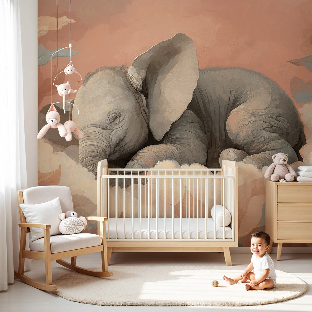 Kids-Mundo sleeping baby elephant wall mural shown as a wallpaper feature above a cot in a nursery.