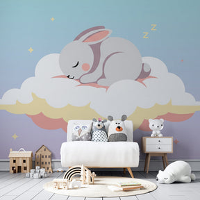 Dreamy bunny cloud wallpaper creating calming kids bedroom atmosphere with soft lighting