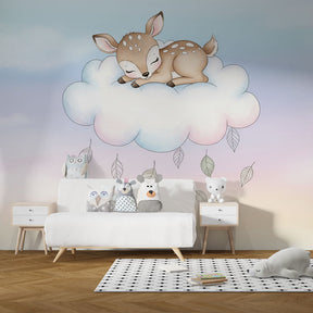 Dreamy deer cloud wallpaper creating serene atmosphere in modern nursery with natural wood furniture