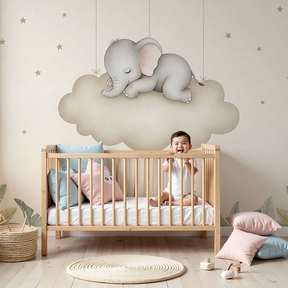 Kids-Mundo sleeping elephant cloud wall mural in a soft cream nursery above a cot