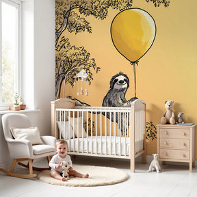 Sloth mural wallpaper with yellow balloon creating peaceful nursery decor by Kids-Mundo