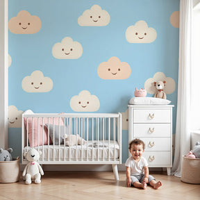 Smiling clouds mural wallpaper creating cheerful blue sky atmosphere in modern nursery by Kids-Mundo