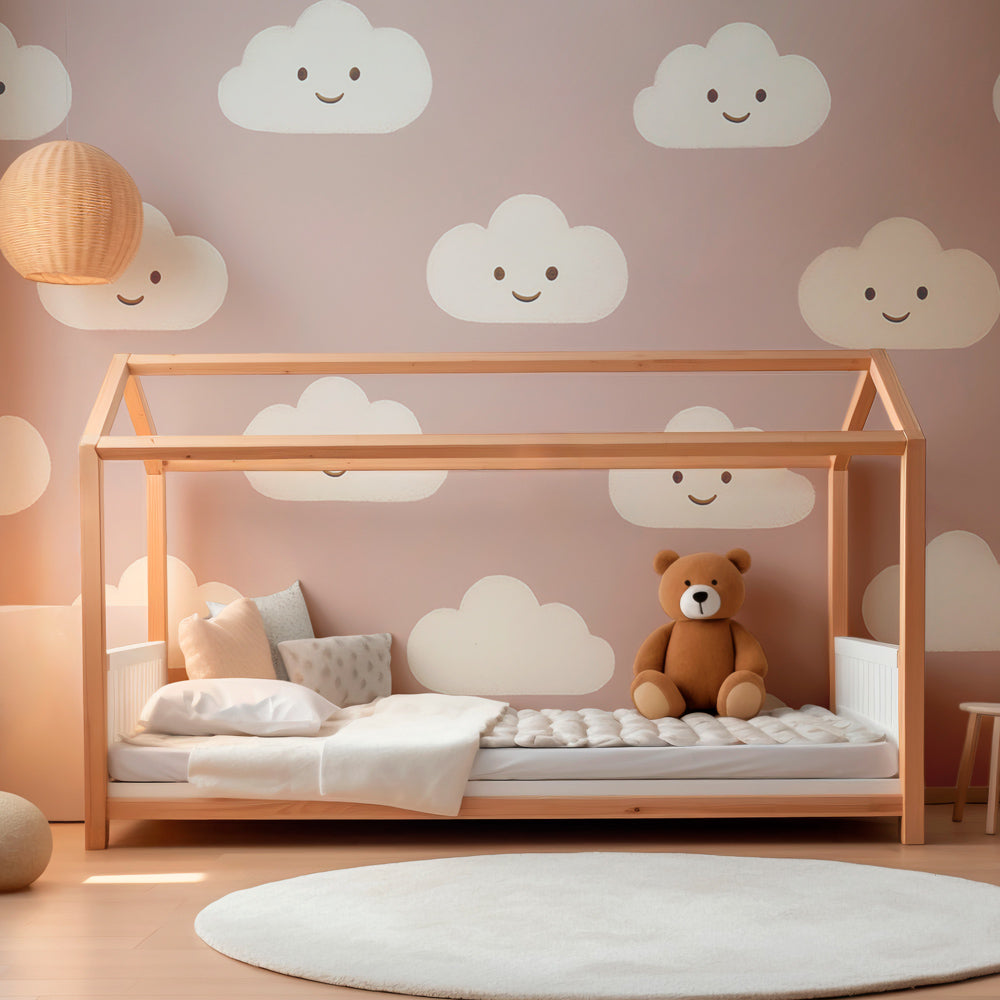 Whimsical pink clouds mural wallpaper bringing joy to children's playroom decor