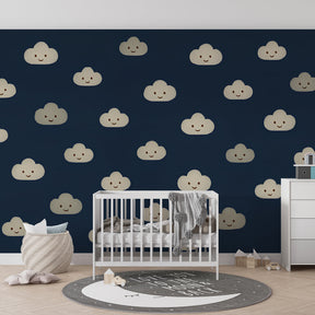 Cheerful clouds mural wallpaper with navy background in cozy toddler room setting