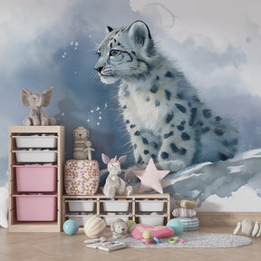 Winter wildlife wallpaper with snow leopard design decorating children's bedroom wall