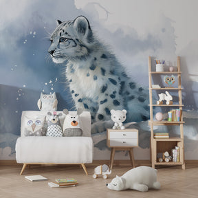 Arctic animal mural wallpaper featuring young snow leopard in blue winter themed kids playroom