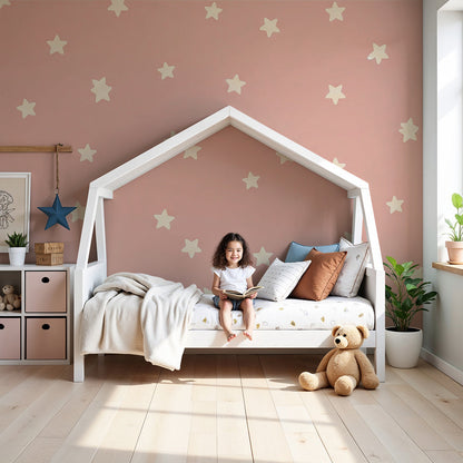 Kids-Mundo soft pink star wall mural styled in a calm baby girl's nursery with a cot nearby.