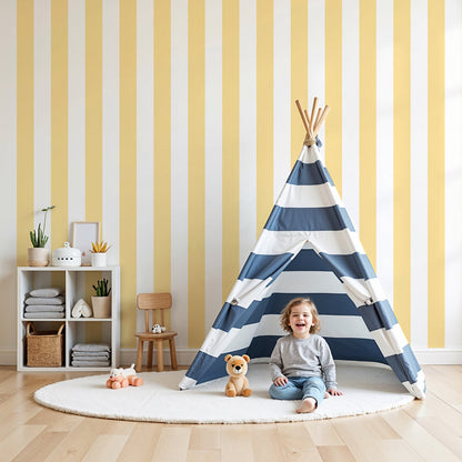 Kids-Mundo soft yellow stripe wall mural behind a white cot in a sunny nursery