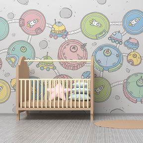 Moon exploration themed mural wallpaper creating cosmic kids bedroom decor with spaceships