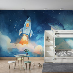 Blue space rocket wallpaper creating cosmic atmosphere in children's bedroom decor