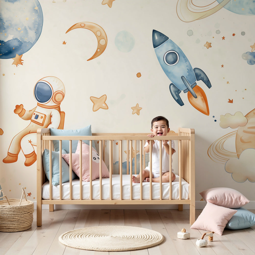 Space adventure mural wallpaper with soft beige stars in modern nursery by Kids-Mundo