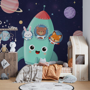 Playful space themed mural wallpaper creating imaginative kids playroom with rocket ship and animal friends