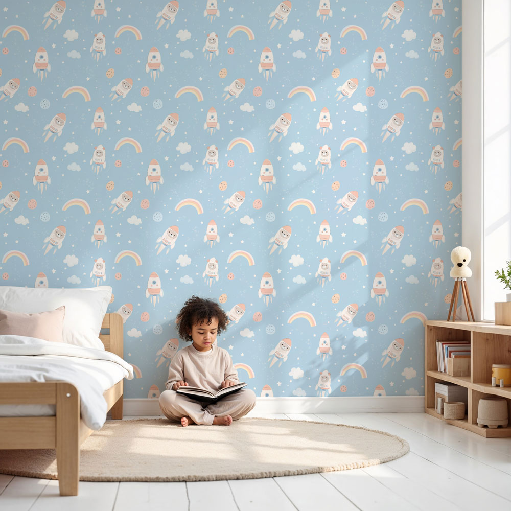 Space astronaut mural wallpaper with cute rockets decorating modern nursery by Kids-Mundo