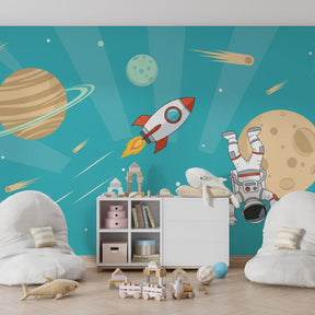 Space-themed mural wallpaper featuring astronaut and blue cosmic scene in children's playroom setting