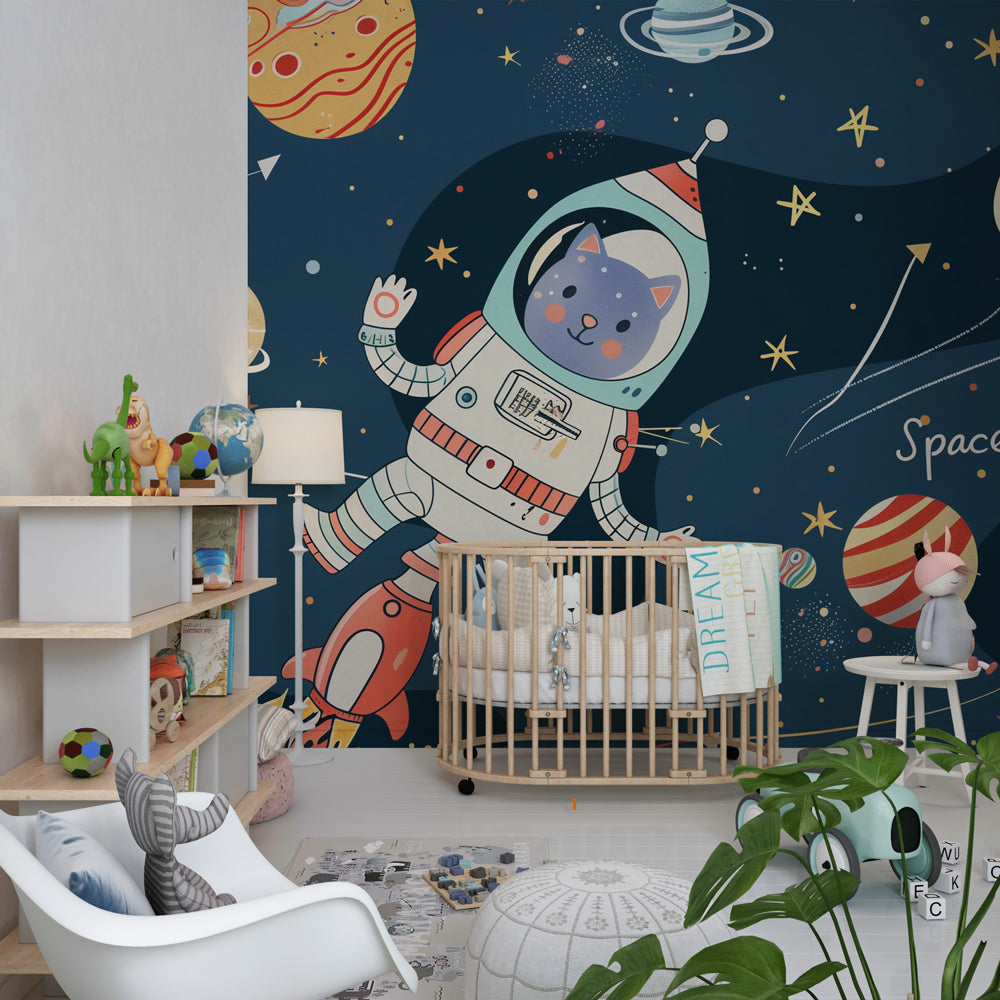 Blue rocket galaxy wallpaper creating cosmic nursery decor with cat astronaut theme