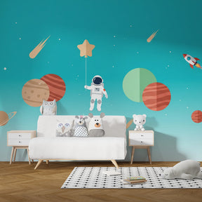 Blue space themed mural wallpaper with astronaut for kids playroom by Kids-Mundo
