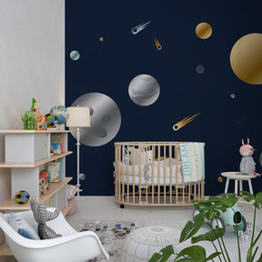 Intergalactic adventure mural wallpaper creating cosmic nursery decor with blue and gold tones