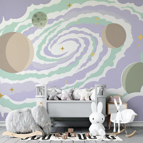 Colorful planets and stars galaxy wallpaper transforming nursery into cosmic adventure space