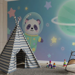 Cosmic panda mural wallpaper with stars and planets in kids playroom by Kids-Mundo