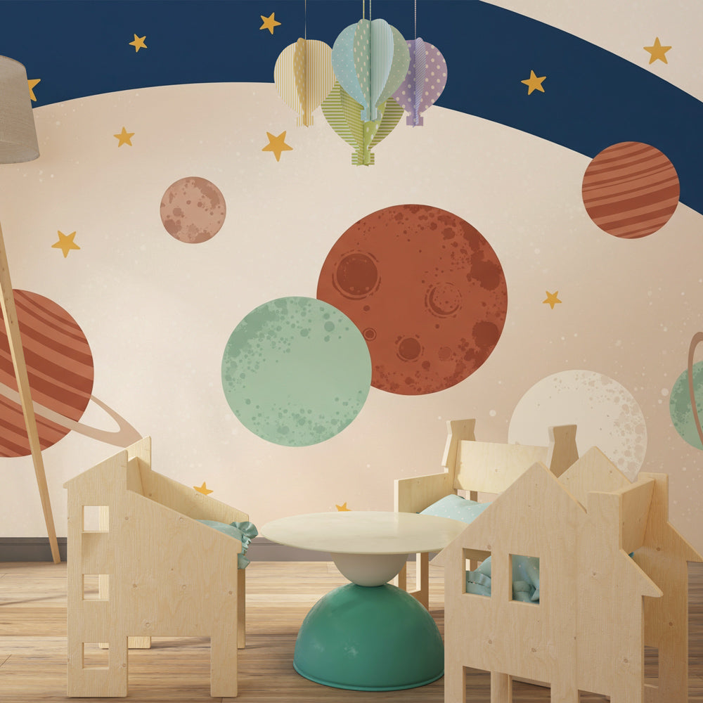 Galaxy adventure wallpaper creating cosmic nursery decor with soft planets and twinkling stars