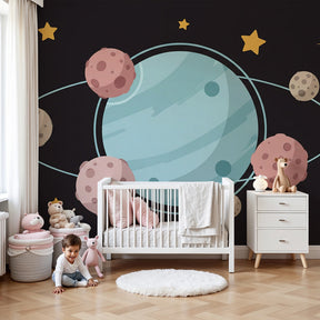 Space planet mural wallpaper creating cosmic nursery decor with soft blue and pink galaxy theme by Kids-Mundo