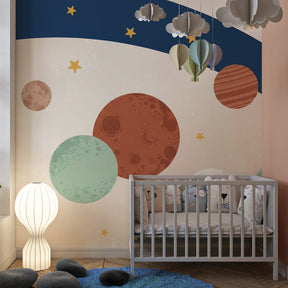 Space themed mural wallpaper transforming children's playroom into intergalactic adventure zone