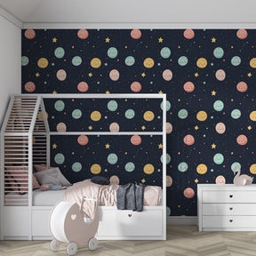 Starry sky planets wallpaper creating magical kids bedroom atmosphere with soft colors