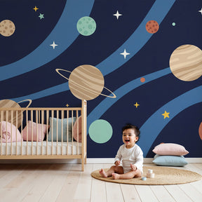 Space planets mural wallpaper creating cosmic nursery decor with soft blue tones by Kids-Mundo