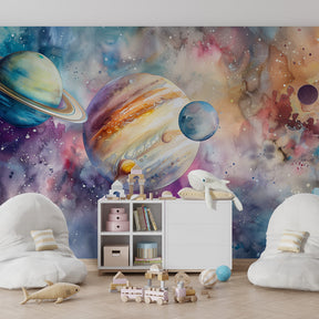 Space universe mural wallpaper with watercolor planets in bright playroom setting