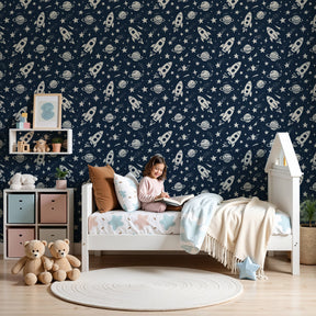 Space rocket mural wallpaper with planets in modern kids bedroom by Kids-Mundo
