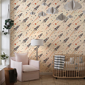 Colorful rocket and star wallpaper creating cosmic adventure theme in kids bedroom