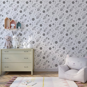 Grey rocket and planet wallpaper decorating modern kids bedroom with space theme