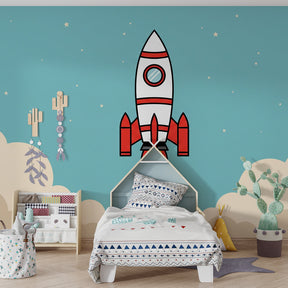 Red rocket wallpaper creating adventure themed kids bedroom decor with beige clouds