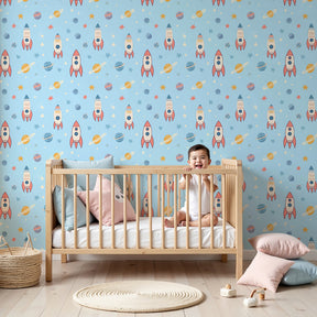 Space rocket mural wallpaper with colorful planets in modern kids bedroom by Kids-Mundo